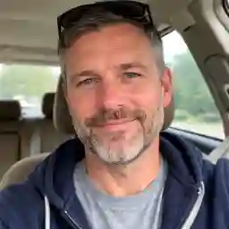 Player testimonial photo of Michael Turner from Newcastle, Australia, sharing experience with Dragon Slots Casino AU